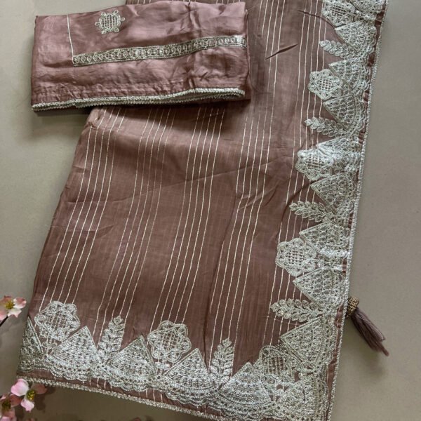 Soft Silk Sarees with Metallic Thread Work Border