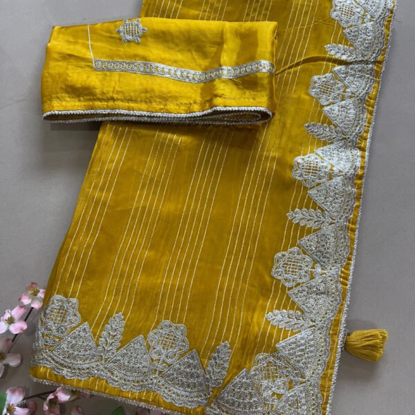 Soft Silk Sarees with Metallic Thread Work Border